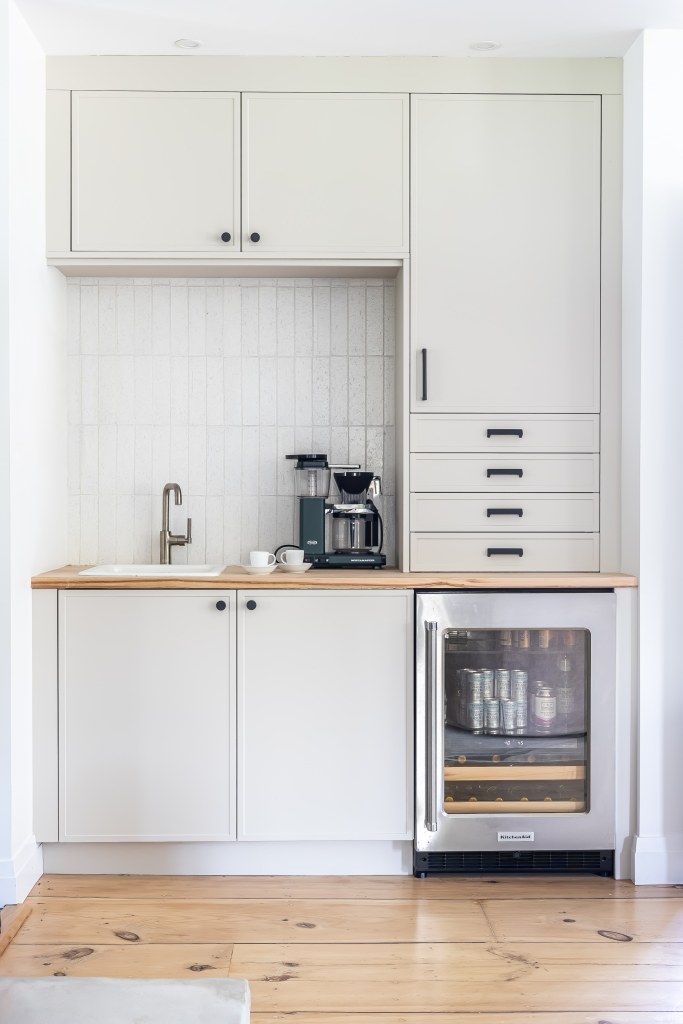 Kitchenette with sink and mini fridge